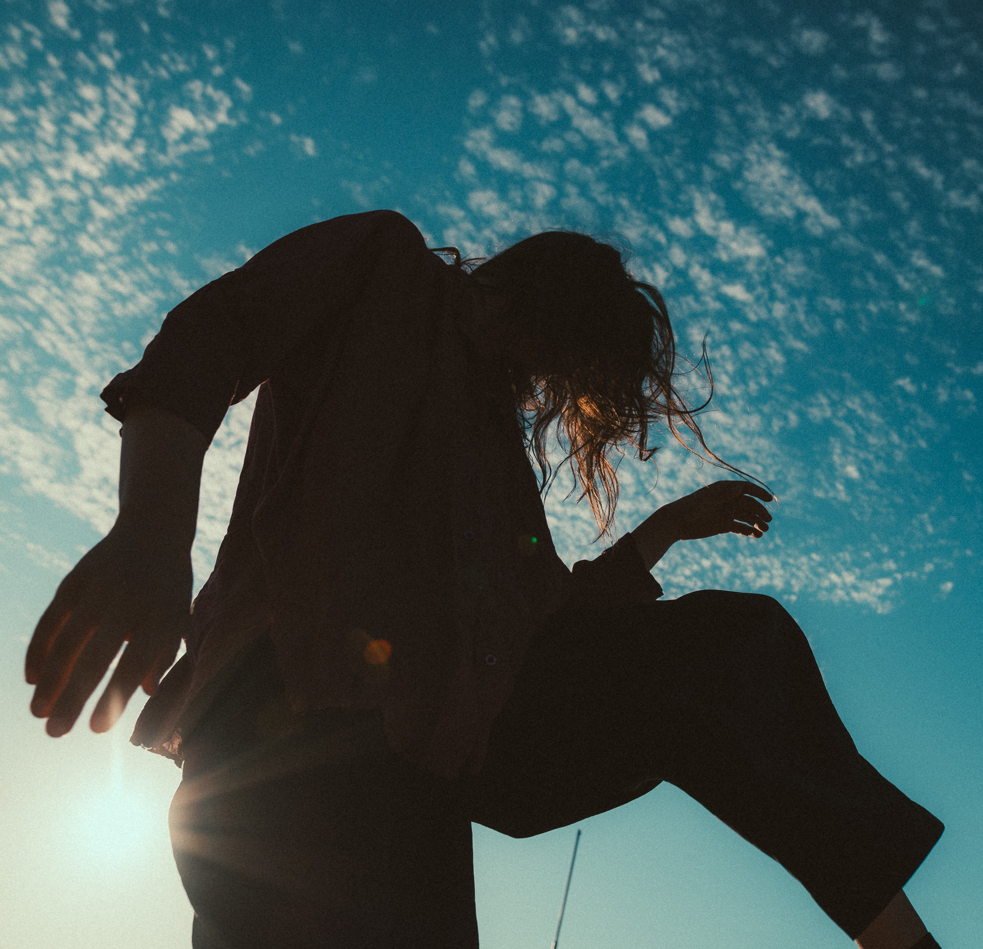Sunday Dance Groove: dancer in backlight