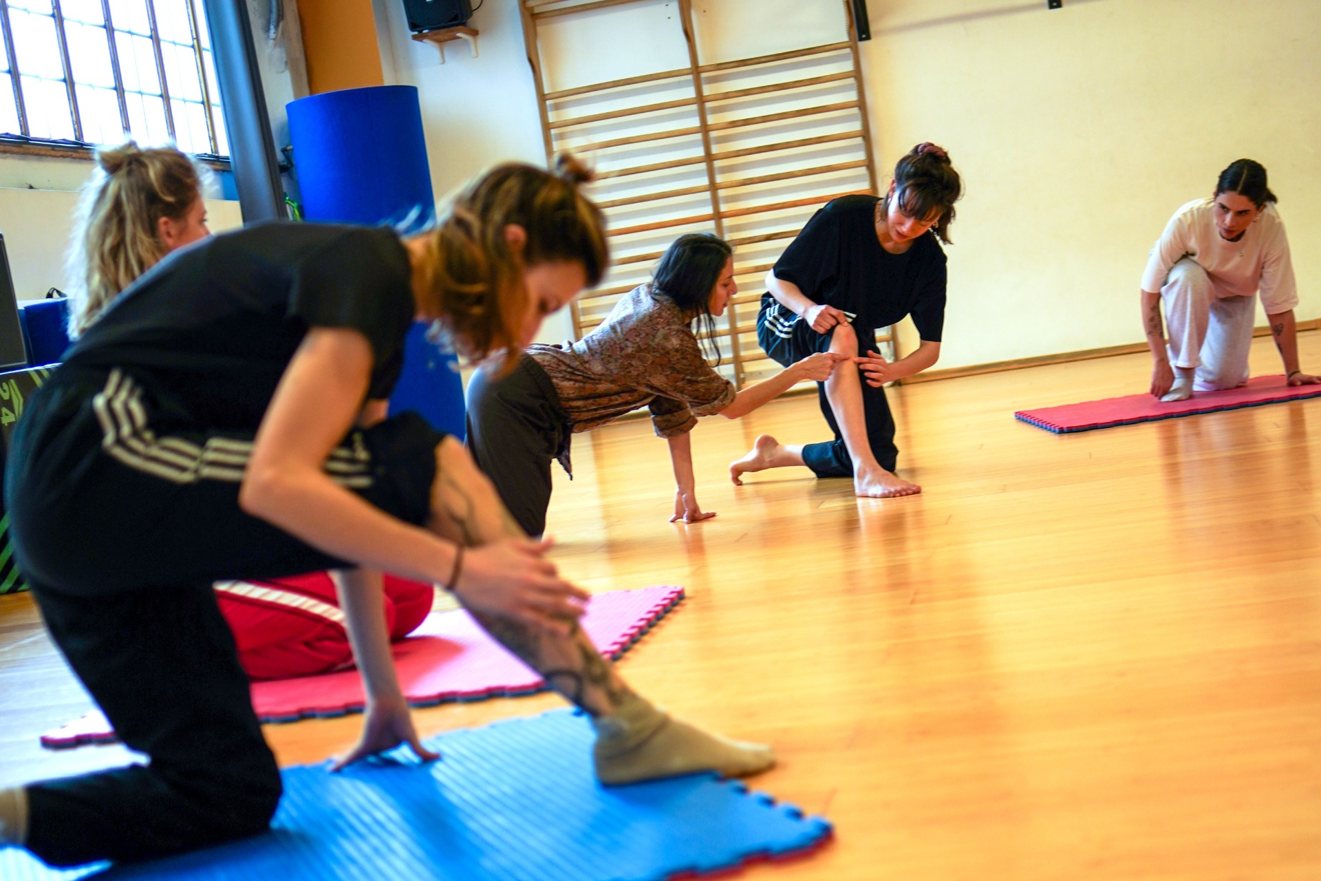 Teaching practice — participants exploring floorwork